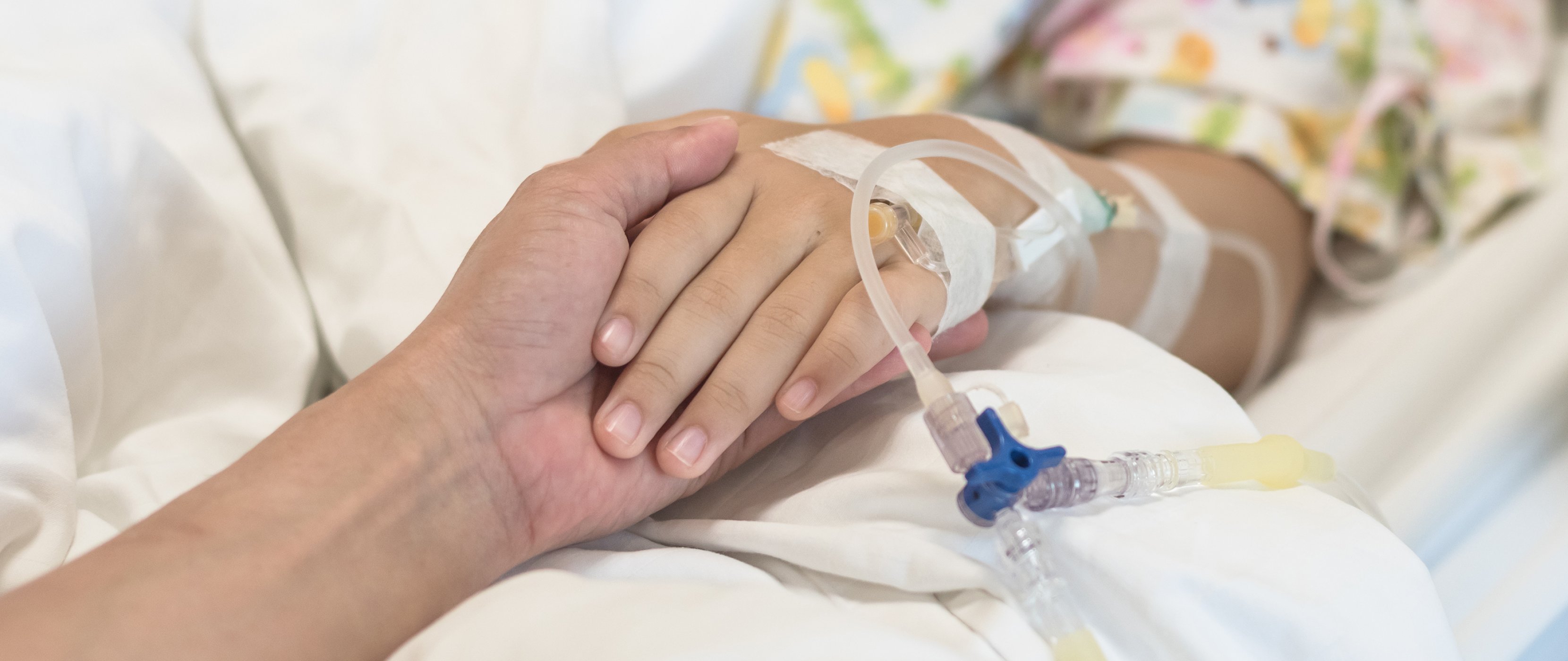 Nurse who's making a heart with her hand